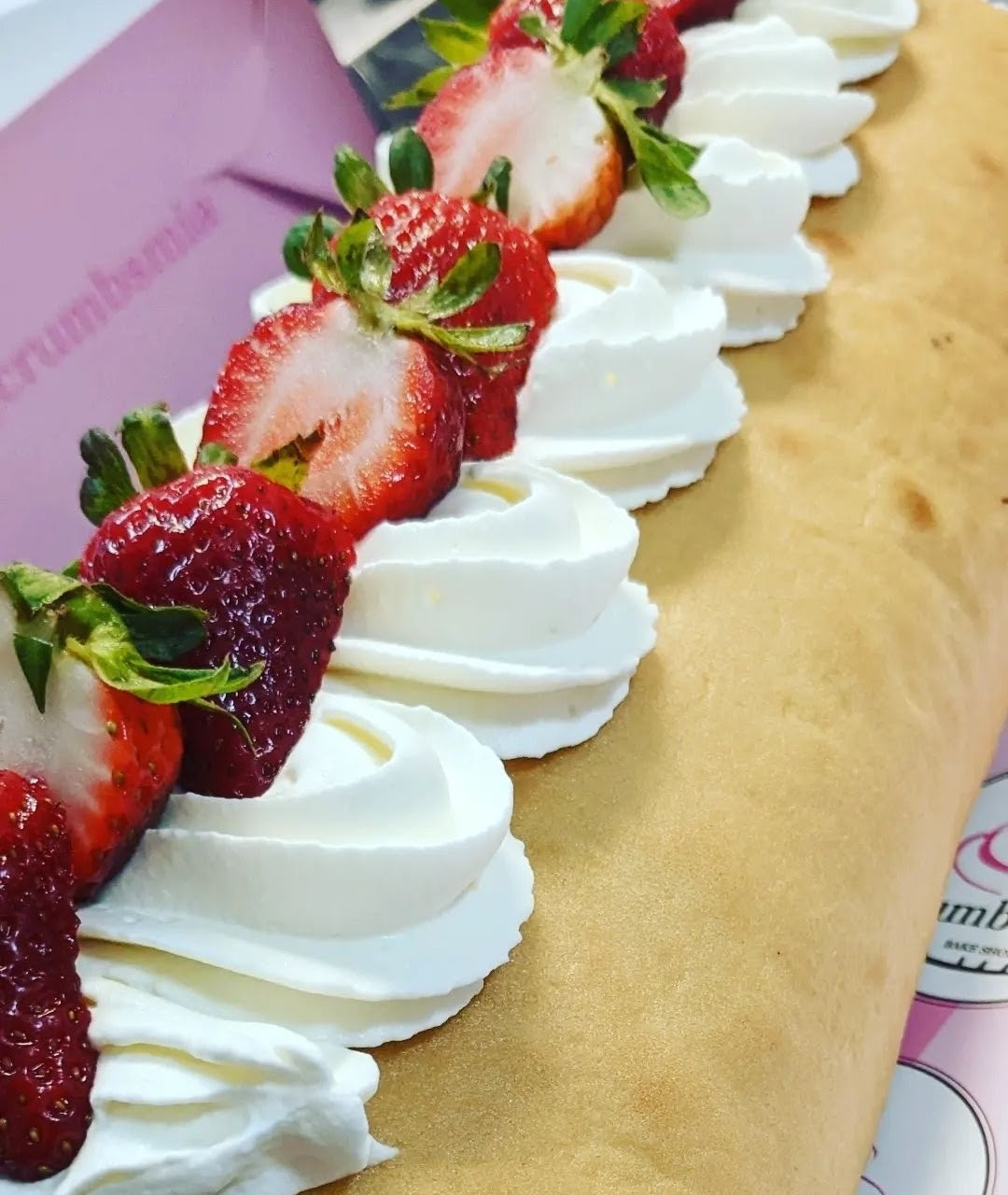 Cake roll with Chantilly and strawberries